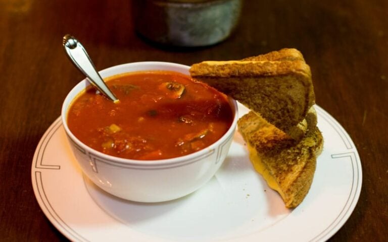 Grilled cheese going headlong into tomato soup