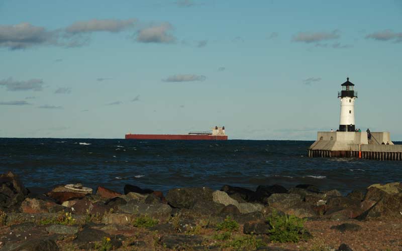 Ship sailing outside the harbor
