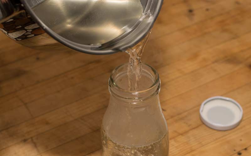 Simple syrup is done when the liquid turns clear