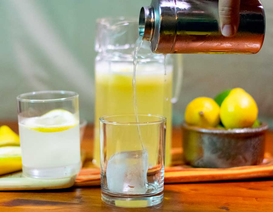 mixing and pouring a margarita