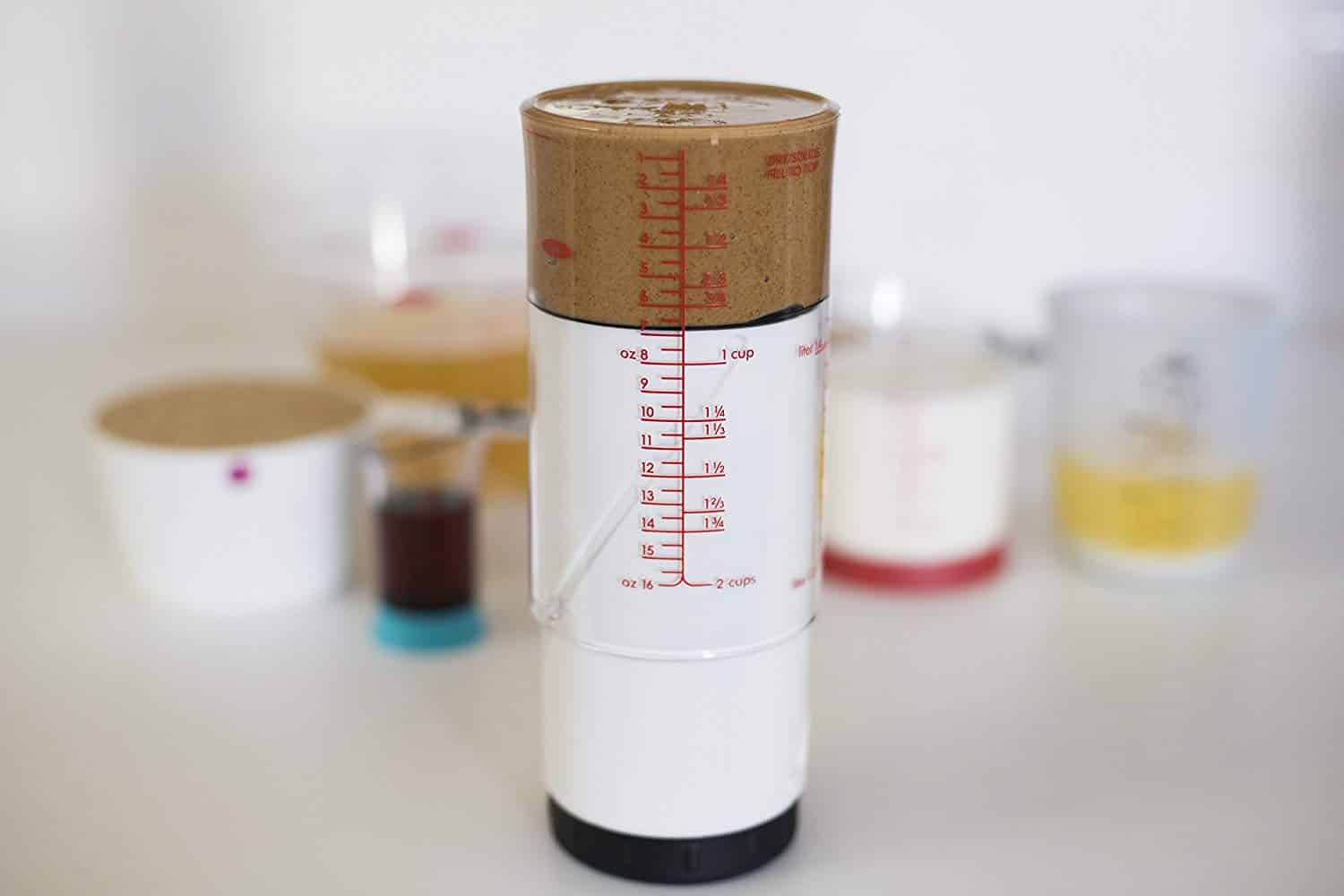 Peanut butter measuring cup