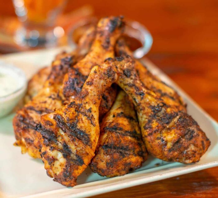 Smoked Chicken Legs on plate ready to eat.